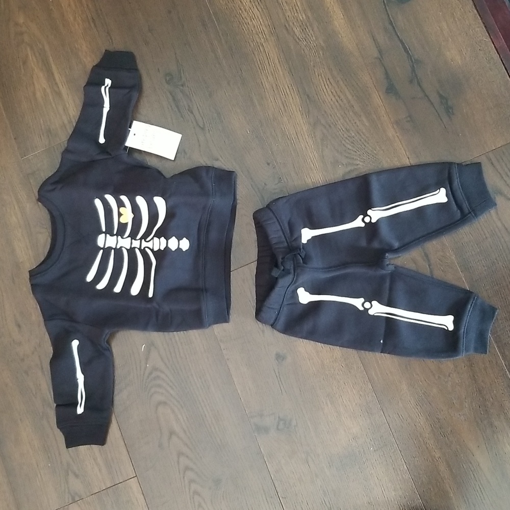 2 piece skeleton Halloween outfit, size 6 months, black and white, new.